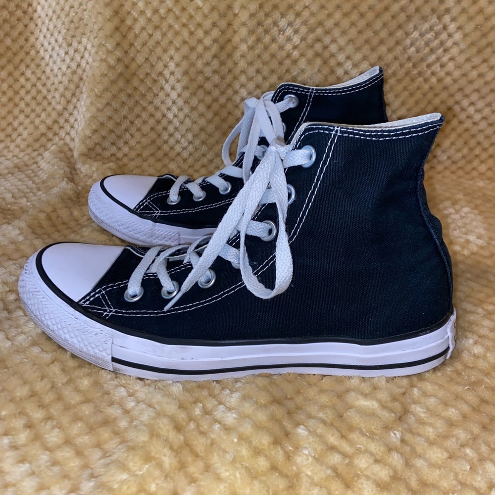 Black and white high top converse